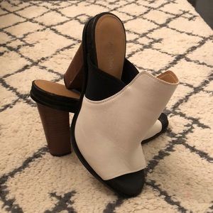 Calvin Klein “Peggy” black & white leather mules